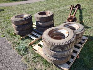lot 44 image: (2) Trailer House Axles & (11) Rims...