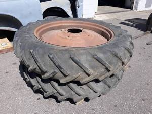 lot 119 image: Set of (2) 38 Tractor Rims w Tires - 9-Bolt