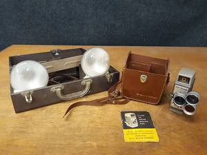 lot 214 image: Bell & Howell 252 8mm Movie Camera and Backlighting Set