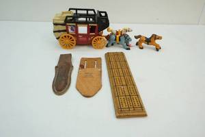 lot 70 image: Vintage toys and knife sheaths