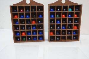 lot 73 image: Cap display with caps