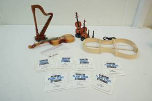lot 91 image: String instrument parts
