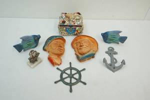 lot 129 image: Sailor and ocean dcor