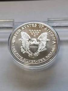 1991 AMERICAN SILVER EAGLE 1 TROY OZ. .999 FINE SILVER IN AIRITITE