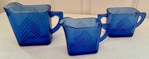 lot 8 image: Vintage Glass Milk Pitcher, Creamer and Sugar