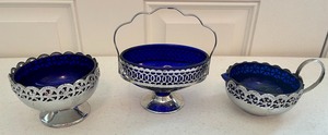 lot 10 image: Cobalt Glass Serving Pieces with Silver Overlays