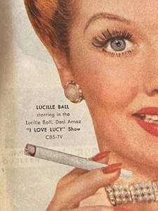lot 173 image: Lucille Ball Phillip Morris Ad From The Saturday Evening Post in a Vintage Frame