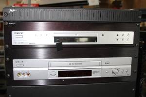 lot 64 image: Middle Atlantic Equipment Rack with Sony VHS VCR DVD & Other Miscellaneous Pro Audio  Video Items