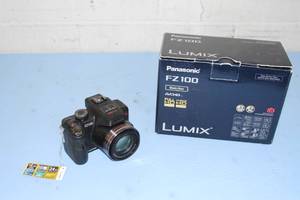 lot 88 image: Lot of Panasonic Lumix Professional Digital Cameras & Accessories
