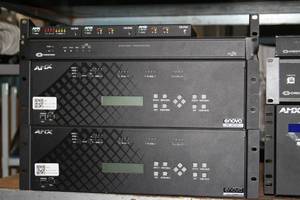 lot 125 image: Lot of Miscellaneous AMX & Crestron Pro Audiovisual Control Equipment