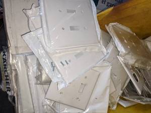 lot 104 image: Bucket Full of Electrical Face Plates, New