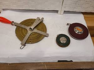 lot 92 image: VINTAGE SURVEYORS TAPE MEASURERS