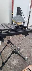 lot 8 image: FLORCRAFT 7 INCH WET TILE SAW WITH LASER AND STAND
