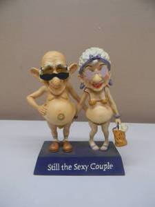 lot 28 image: COOTS STILL THE SEXY COUPLE BOBBLEHEAD - VERY COOL PIECE - APPROX 6 - SEE PICTURES