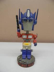 lot 57 image: NECA  OPTIMUS PRIME TRANSFORMERS HEADKNOCKER - AWESOME - VERY COOL PIECE - APPROX 8 - SEE PICTURES