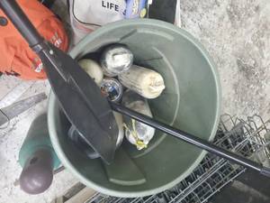 Boat floatation buoys, oar and outside garbage can&nbsp