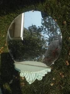 Vintage Ornate Mirror Approximately 13 round.