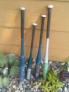 Softball and Baseball Bats (4) - good handle grips.