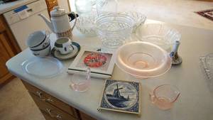 lot 59 image: Miscellaneous Items--Holland Trivet--Poinsettia Trivet--Kun-Luv-Tea Pitcher--1 Sauce & 2 Soup Bowls-Coffee Cup-5 Glass Bowls--3 Flower Vasess