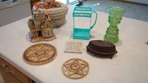 lot 41 image: Insulators- Coaster-Wicker Bun Warmer Container-Asbestos Sad Iron-San Antonio, Texas Ceramic Bird House-Plastic 12 Gal Carton Holder