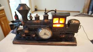 lot 51 image: Antique Electric United Clock Train Engine