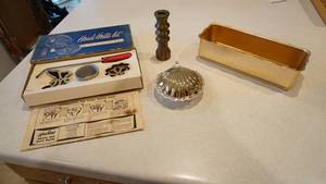 lot 63 image: Mirror-The Finest Aluminum 2090KM-Very Heavy Brass Candle Stick-Silver Sea Shell Shaped Dish-Handy Hostess Kit Waffle & Patty Shell Mold