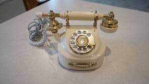 lot 79 image: Antique Cream Colored Dial Phone