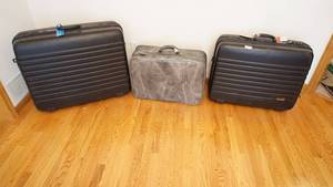 lot 97 image: Three Suitcases--Black President Hard Side On Rollers--Black President Hard Size--Grey American Tourister