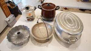 lot 99 image: West Bend Electric Crock Pot-Cream Colored Electric Hitachi Rice Maker-Aluminum Roaster W Cover-Heavy Duty Pan-Bundt Cake Pan