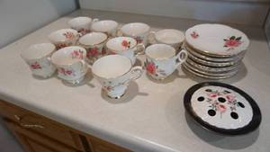 lot 120 image: Eleven Bone China Cups & Saucers (All Have Roses On Them) & A China Potpourri Container W Roses On Top Lid