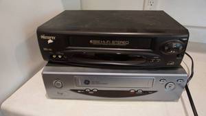 lot 126 image: Two VCRS---Memorex VHS-4 Head HI-FI Stereo-GE VHS-4 Head Clear Picture VCR
