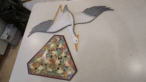 lot 128 image: Triazzle Game By Dan Gilbert--A Loon That Is On Strings That Can Be Hung From A Ceiling Like A Mobile