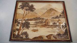 lot 137 image: Framed Picture Of Mountains-Trees-Water-One Boat-Two Buildings (Karya...Hary..Sad.)