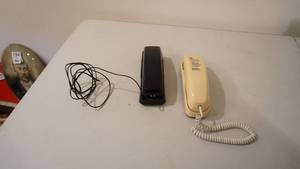 lot 224 image: Yellow Sleek Line Telephone-- Black Lonestar Telephone-Southwestern Bell--Model #718---Serial #043965