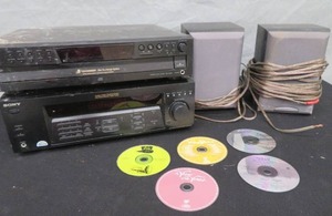 MISC LOT OF CDS,DISC CHANGING SYSTEM AND AUTIOVIDEO CONTROL CENTER AND TWO SONY SPEAKERS