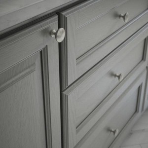 lot 22 image: Essentials Fulton 1-316 in. (30 mm) Satin Nickel Cabinet Knob (10-Pack)