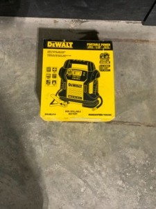 DEWALT 1400 Peak Amp Portable Car Jump Starter with Digital Compressor. See Pictures