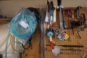lot 104 image: Peg Board Wall Board With Assorted Tools