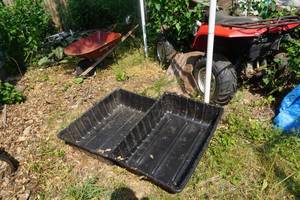 lot 139 image: 2 Large Black Plastic TotesTubs