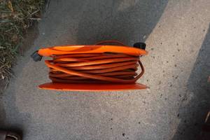 lot 106 image: Plastic Electrical Cord Hose Reel With Cord