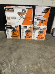 lot 9 image: Pallet With Ridgid Shop Vacs & RIDGID 9 Amp Corded 7 in. Wet Tile Saw With Stand See Pictures