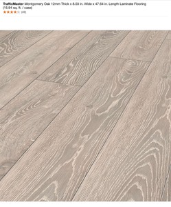 lot 15 image: Mix Pallet With 7 TrafficMASTER Oak 6 in. W x 36 in. L Luxury Vinyl Plank Flooring (24 sq. ft.  case) & 3 TrafficMaster Montgomery Oak 12mm Thick x 8.03 in. Wide x 47.64 in. Length Laminate Flooring (15.94 sq. ft.  case) & 2 Misc Cases Of Flooring