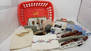 lot 21 image: Clothes Basket Filled With Miscellaneous Items