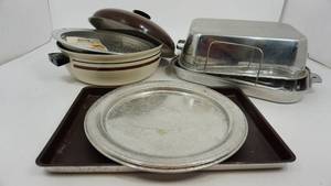 lot 25 image: Wear Ever Aluminum Roaster--Regal Quality Cookware Round Roaster--Westbend 15 12  x  10 12  x  1  Cookie Sheet--West Bend Round Serving Tray