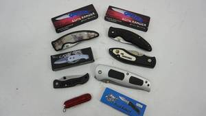 lot 65 image: A Variety Of Folding Knives