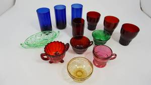 lot 103 image: Three Blue Beverage Glasses--Red Glass Sugar Bowl--Green & Gold Dessert Cups--One Pink Creamer--Four Deep Red Glasses--Lt Green Candy Dish