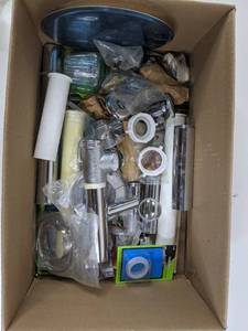 Assorted Box of Plumbing Supplies - Angle Valves - Faucets - Tub Faucets - Clog Buster - faucet Hook Up Tubes - Tank Bolts