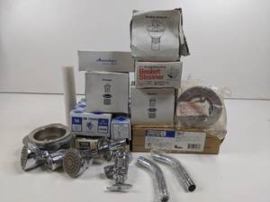 Assortment of Plumbing Supplies - Shower Heads - Sink Faucets - Strainers - Garbage Disposal Mount