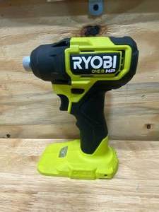 lot 104 image: RYOBI ONE HP 18V Brushless Cordless Compact 14 in. Impact Driver (Tool Only).