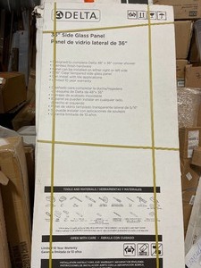 lot 54 image: Delta Classic 36 in. W Frameless 1-Piece Direct-to-Stud Corner Shower Glass Panel in Stainless See pictures customer returns